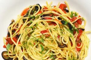 spaghetti with olives, capers and peppers